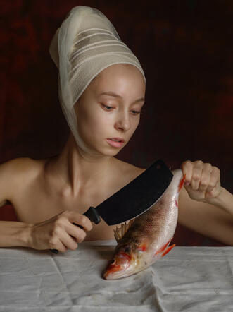 The girl with the fish. The Eucharist. (Tezos)